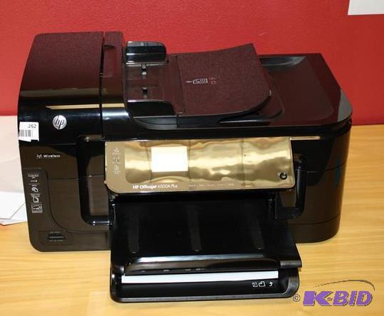 lot 262 image: HP Office jet printer, powers up not tested....