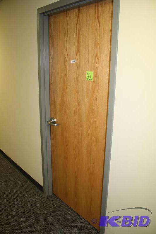 lot 292 image: Oak wood door 36x83" & handles. Meta...