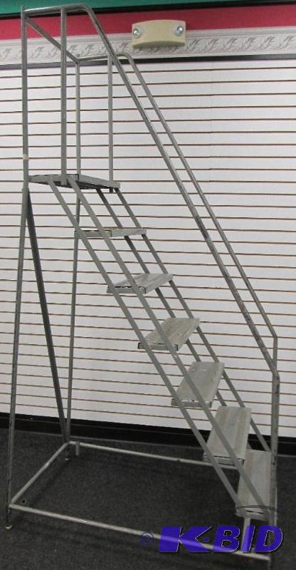 Solid metal ladder, steps go up approximately...