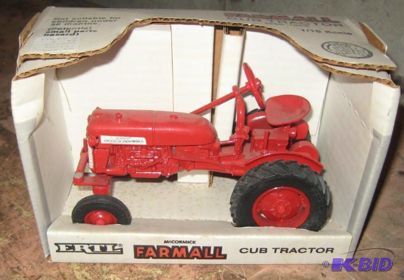 lot 024 image: McCormick FarmAll Tractor Ertl Toy Number 235