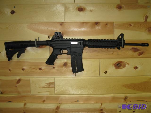 lot 7 image: Mossberg 715T, new in box tactical .22 LR, ta...