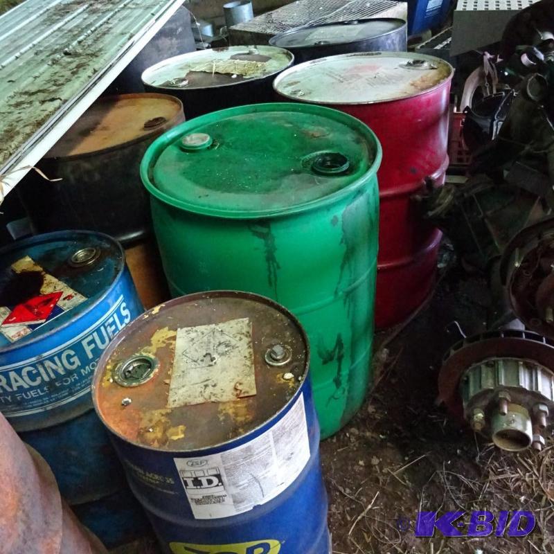 Used oil container. 55 gal. 5 are steel and 2...