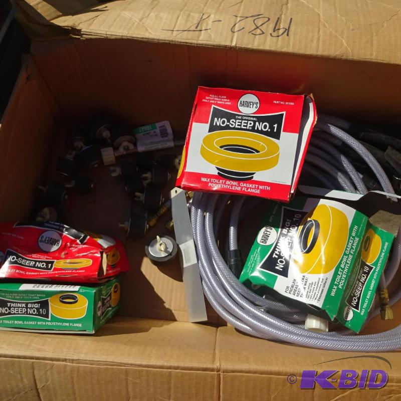 Box of wax toilet bowl gaskets. Faucet spraye...