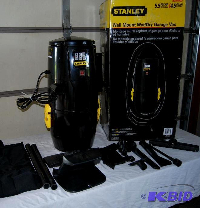 lot 64 image: Stanley Wall Mount 4.5-gallon Wet  Dry Shop ...