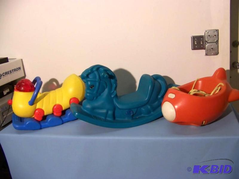 lot 57 image: (2) Kids Plastic Rocker Toys and (1) Plastic Swing