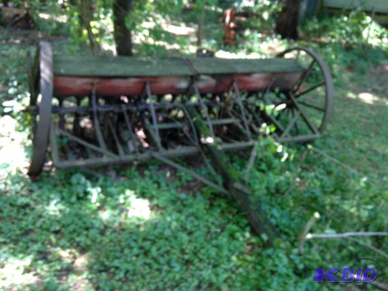 lot 190 image: ANTIQUE JOHN DEERE VAN BRUNT  WOOD BOX PLOW AND PLANTER