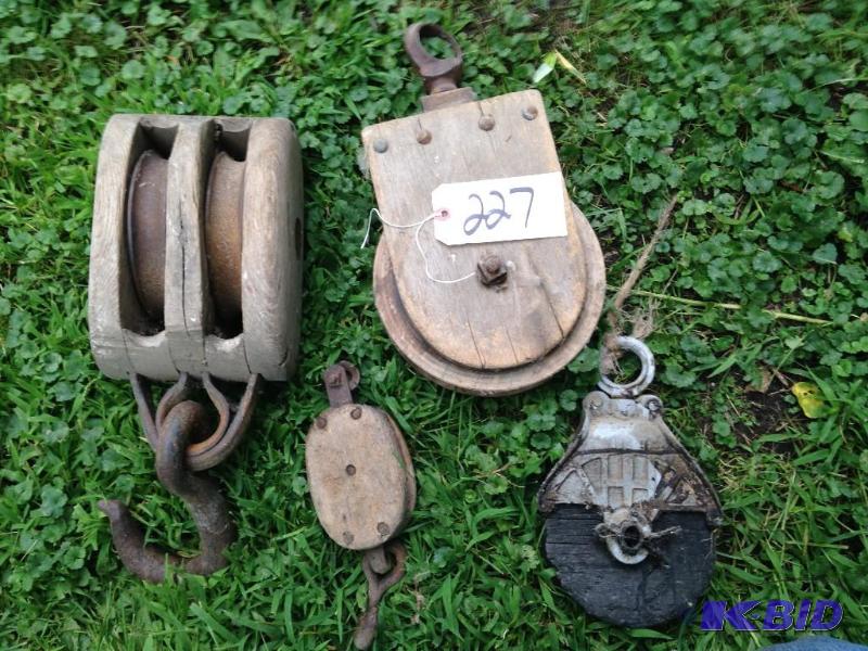 lot 227 image: 4 WOOD PULLEYS