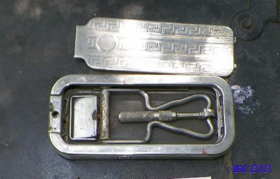 lot 24 image: 1927 Rolls Razor Blade Sharpener Made in England