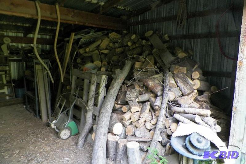 lot 7 image: Huge pile of firewood.
