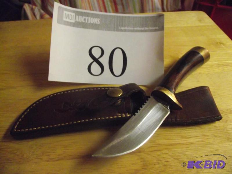 lot 80 image: Browning fixed blade with leather sheath...