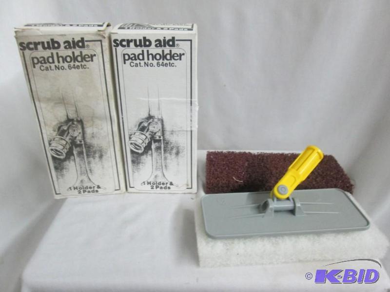 lot 27 image: 2 Boxes - Scrub Aid 1 Holder & 2 Pads