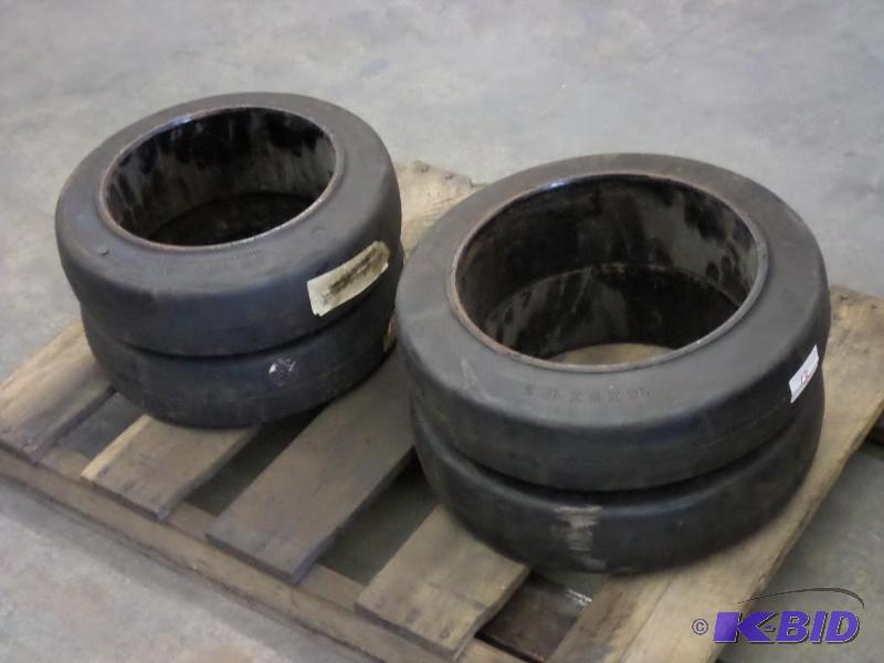 lot 13 image: (4) New 18x5x12.5 Forklift Tires...