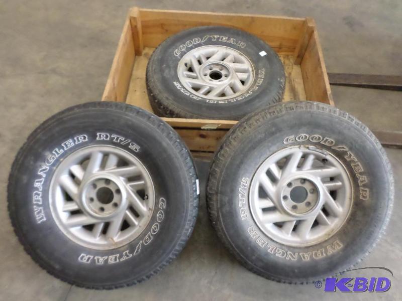 lot 29 image: (3) 6-Lug Rims With Goodyear Wrangler RTS P2...