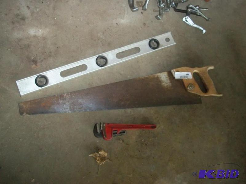 lot 133 image: Misc Tools   level  hand saw  pipe wrench ...