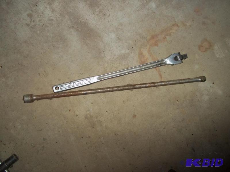 lot 148 image: 12 inch breaker bar with extension...