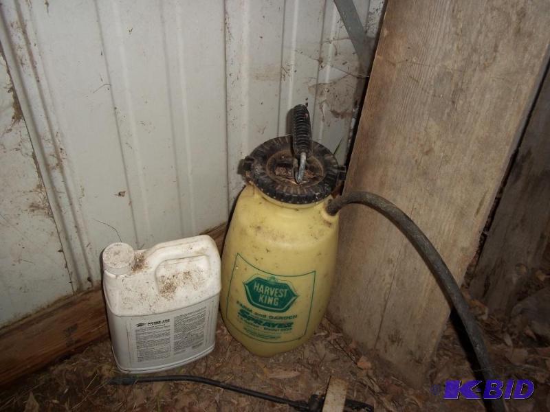 lot 28 image: 1.5 gallon farm and garden sprayer with 12 g...
