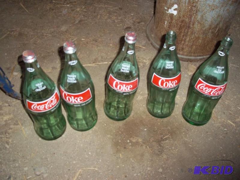 lot 32 image: 5 Vintage quart size glass coke bottles...