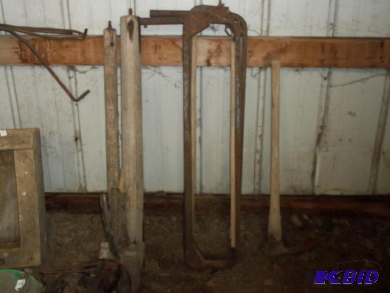 lot 56 image: Lot of wood holler, stanchions, hoe, and spad...