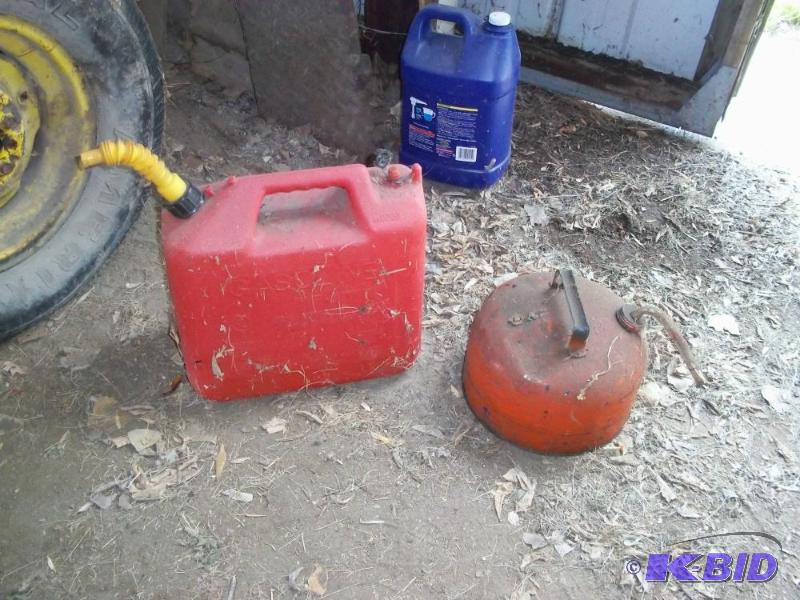lot 61 image: Gas cans   1 metal gas can  5 gallon plastic ...
