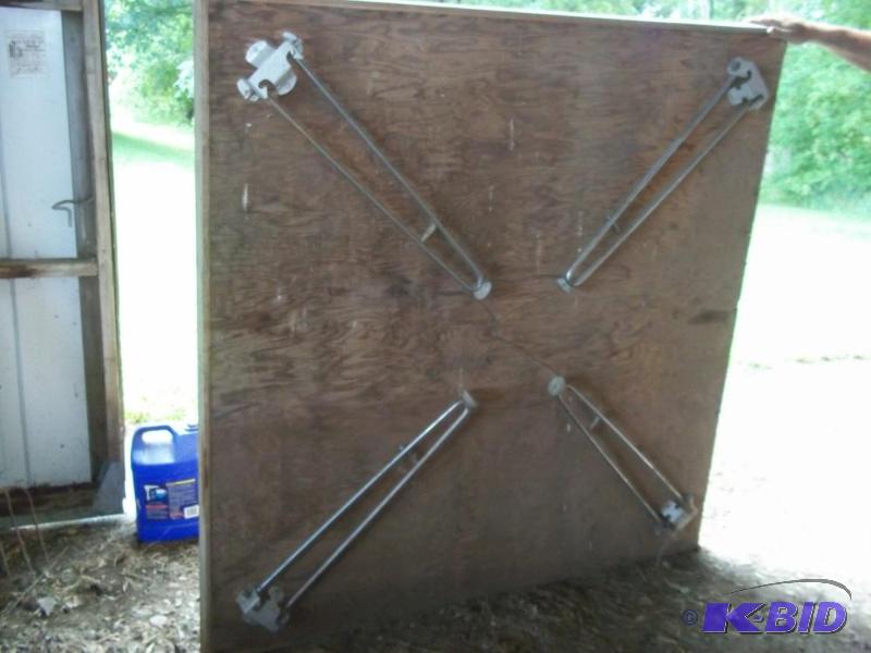 lot 65 image: Square wood table with folding legs...
