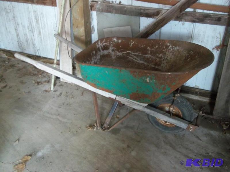 lot 91 image: Green wheel barrow...