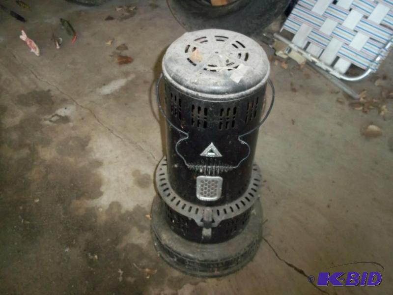 lot 93 image: Vintage portable black kerosene heater...