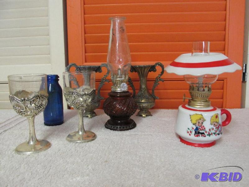 Vintage Oil Lamps, Goblets, Vases and a Blue Glass Jar.
