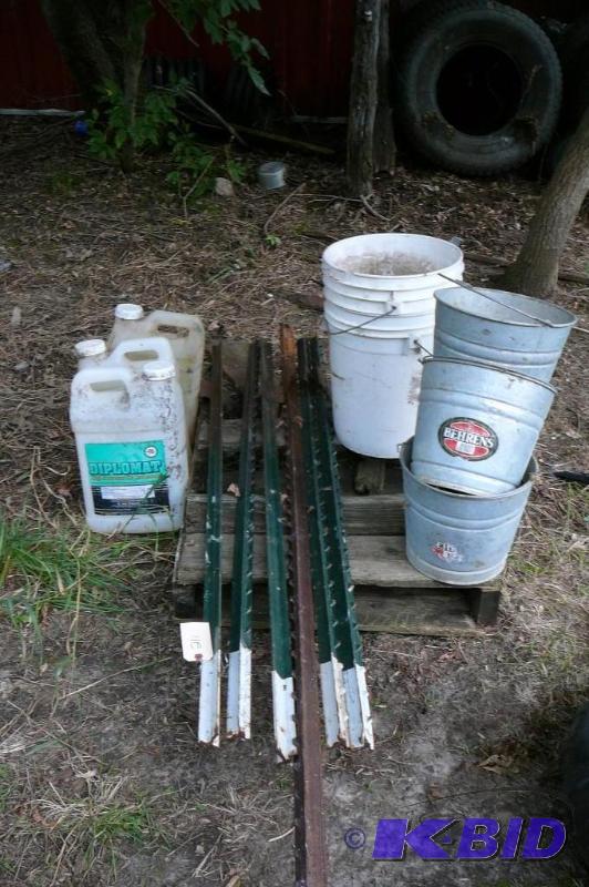 lot 211 image: 6T fence posts amd miscellaneous plastic buck...