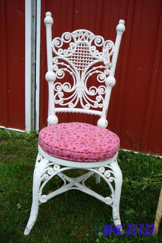 lot 229 image: Wicker Chair with fabric seat...