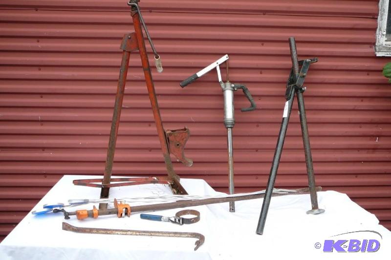 lot 319 image: 4" Bar Clamp, Old bumper Jack, Pipe bend...