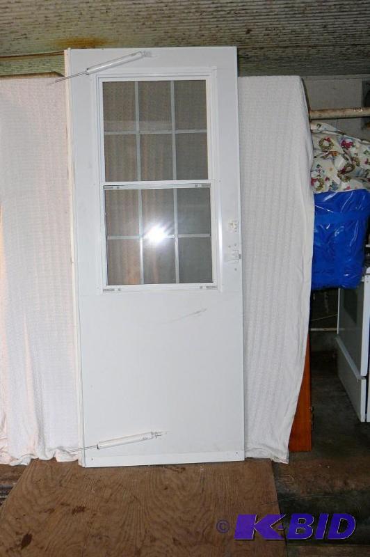 lot 337 image: Storm Door 31 12 x 80"...