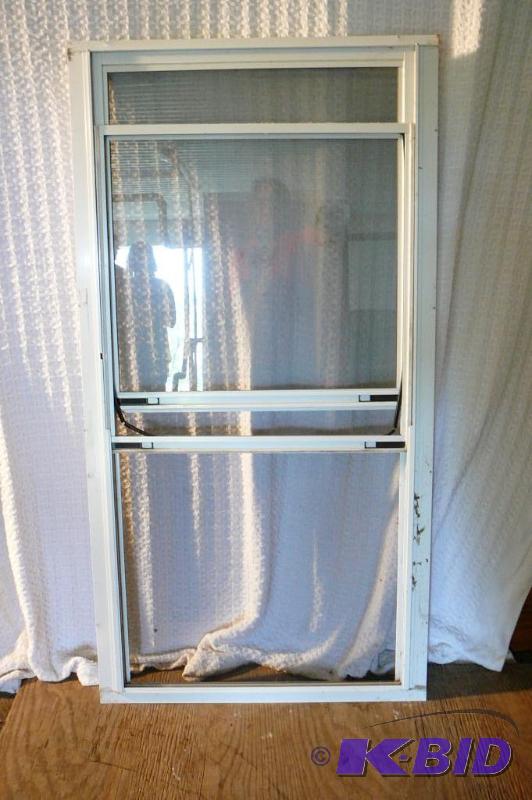 lot 338 image: 6- Storm window 28 x 54...