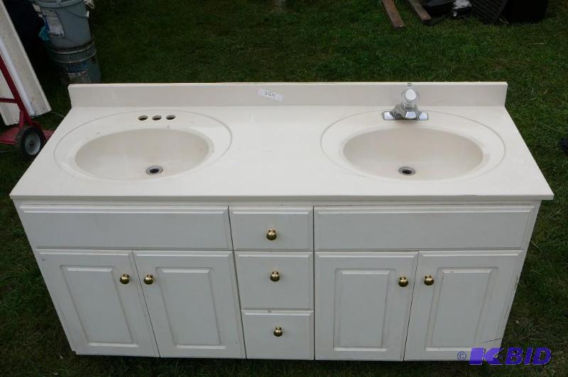 lot 354 image: Vanity double sink 1 faucet 33" x 22 dee...