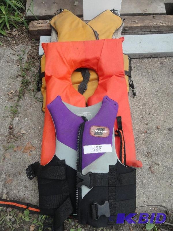 lot 388 image: 3 life jackets - 1 Neoprene Sterns 26-29 yout...