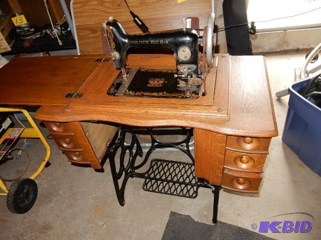 lot 31 image: GOLDEN RULE - A TREADLE Sewing machine