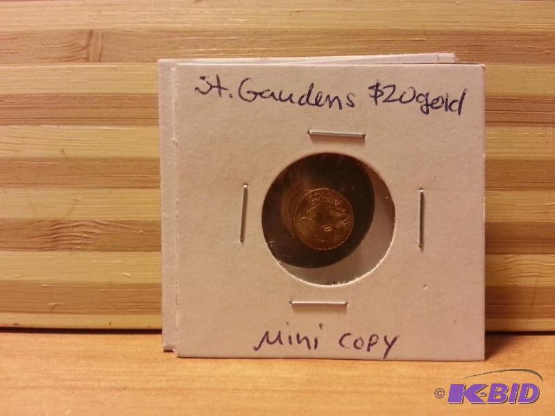 lot 150 image: ST. GAUDENS GOLD MINI COPY COIN, APPROX 11MM ...