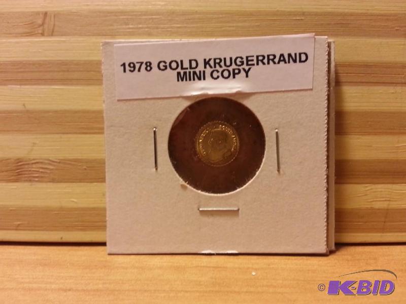 lot 152 image: 1978 GOLD KRUGERRAND MINI COPY COIN, APPROX 1...