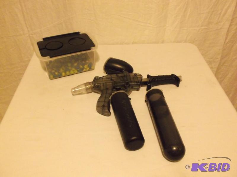 lot 105 image: Paint ball gun with storage tubes & bin w...