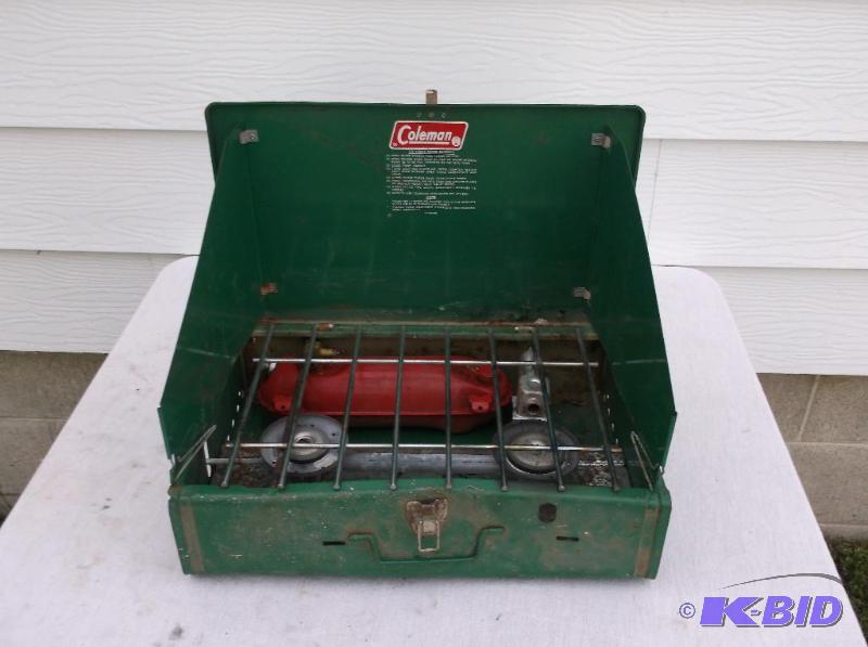 lot 123 image: Coleman camp stove appears in usable conditio...