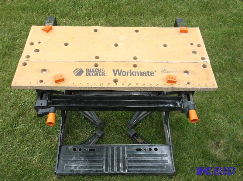 lot 125 image: Black & Decker vice work bench appears in...