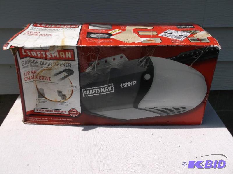 lot 135 image: Craftsman 12 HP garage door opener appears n...