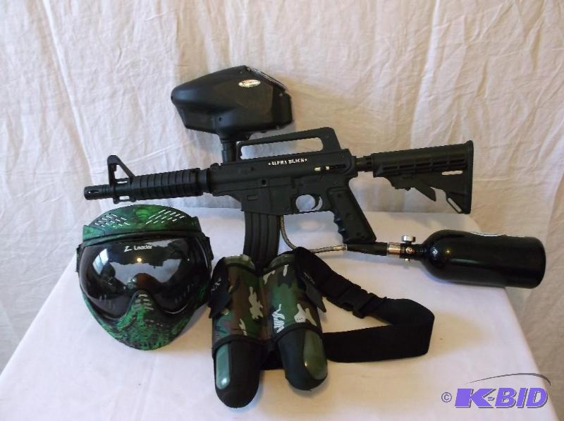 lot 160 image: Alpha Black paint ball gun comes with co2 tan...