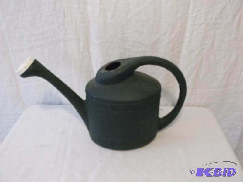 lot 170 image: Large plastic watering can in great usable co...