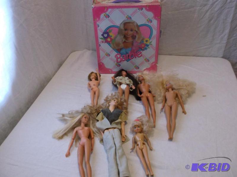lot 21 image: Nice lot of Barbie dolls in carry case....