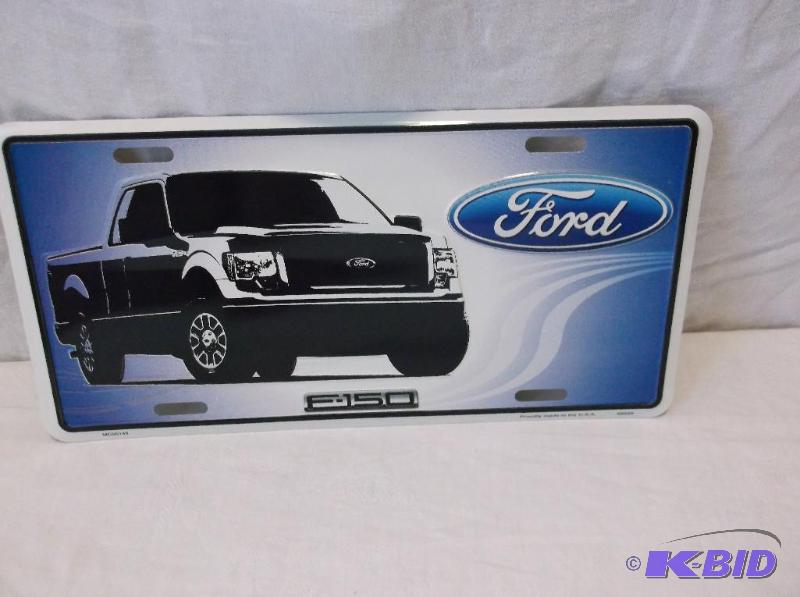 lot 40 image: Collectable embossed Ford license plate sign....