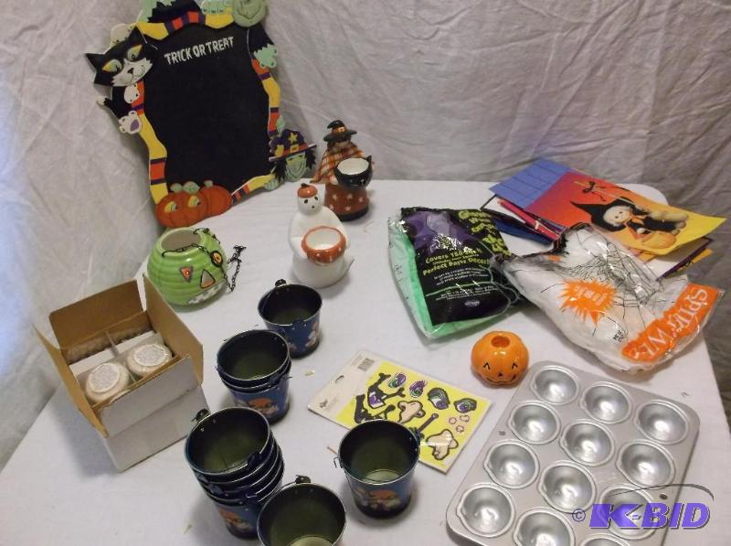 lot 60 image: Large bin full of Halloween decorations....