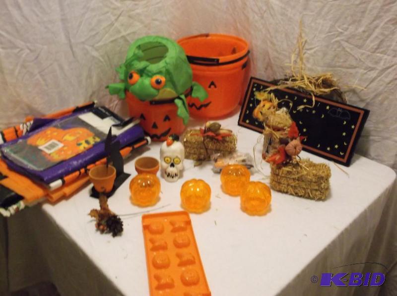 lot 63 image: Large bin full of Halloween decorations....