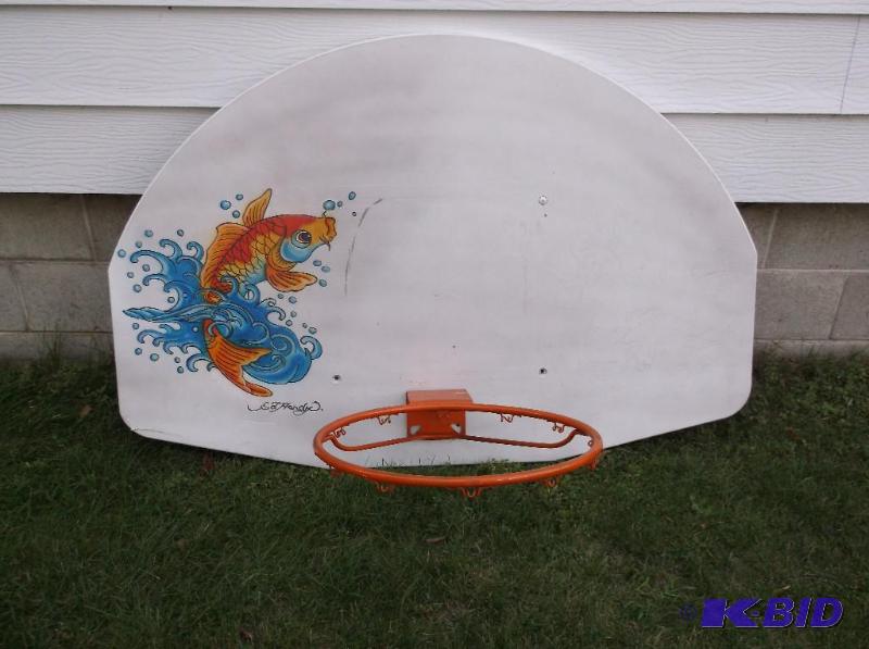 lot 64 image: Basketball hoop with backboard has a  li...