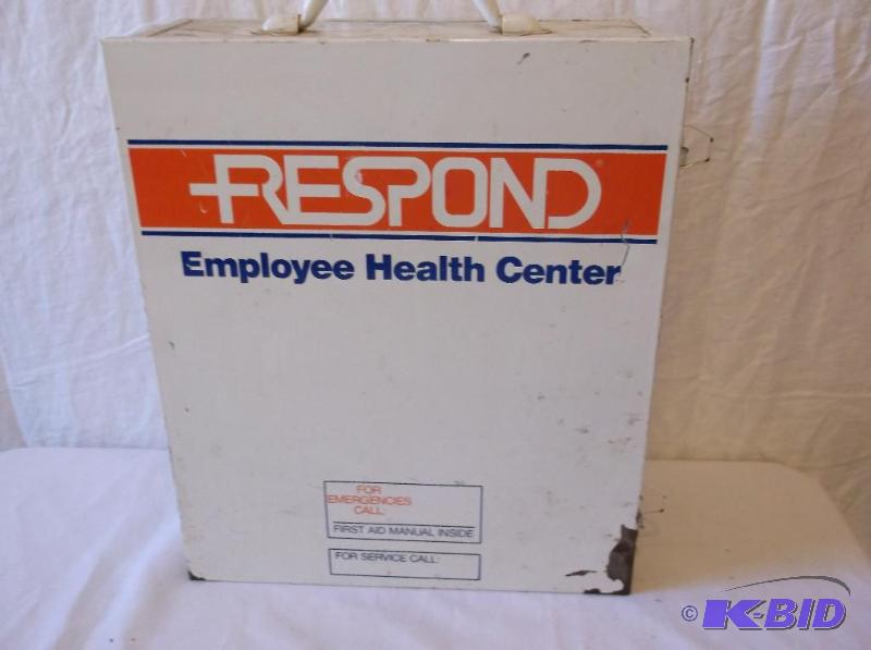 lot 83 image: Wall mount First Aid kit loaded with supplies...