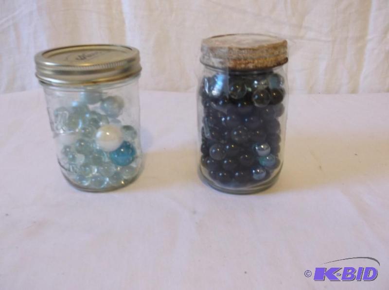 lot 90 image: 2 jars full of marbles....